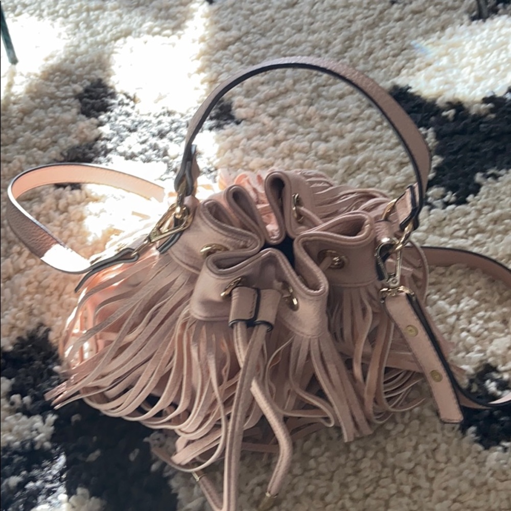Pink fringed handbag
